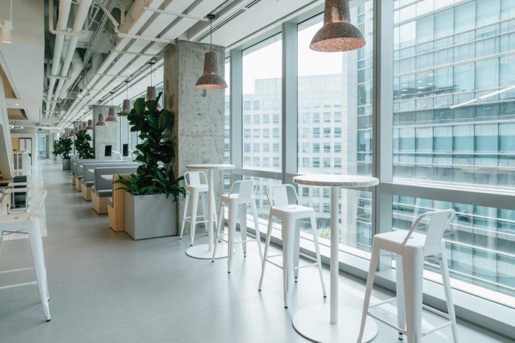 Office interior design in Essex showing modern open-plan workspace with ergonomic furniture and natural light