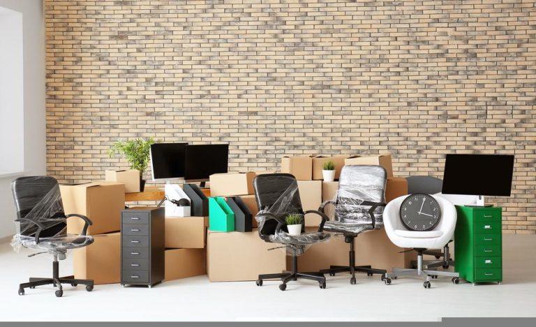 Office relocation in Essex showing team packing desks and IT equipment for secure transport