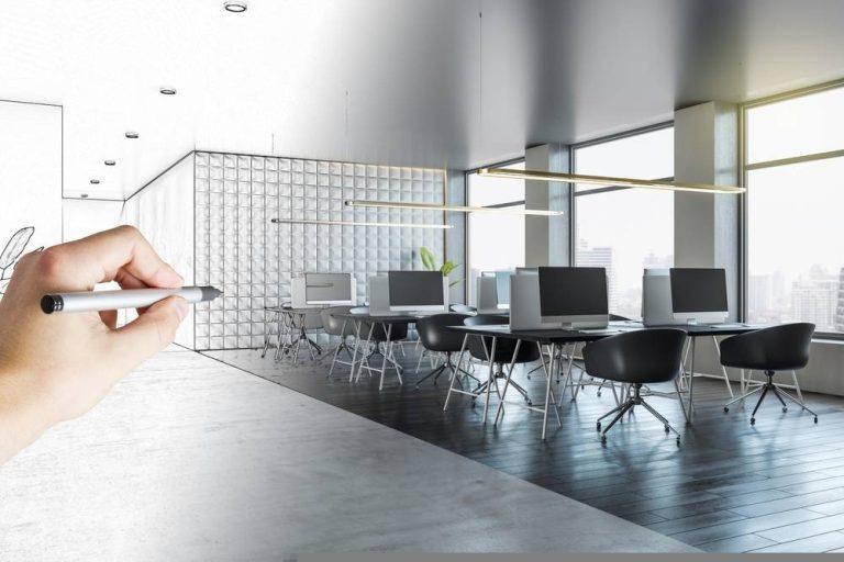 Office refurbishment in Essex showing workspace transformation with new furniture, lighting, and branded finishes